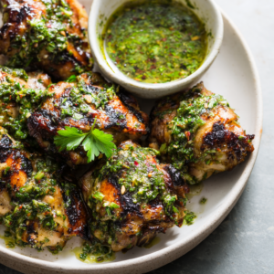 Read more about the article Grilled Chicken Thighs with Chimichurri (Marinade + Sauce)
